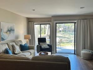 Plenty of seating. Light and Bright Family room.