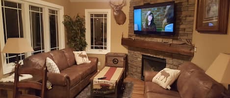 Living Room, Gas Fireplace, Queen Sleeper Sofa, 65" TV, WIFI