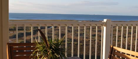 Breakfast is served on the balcony of this beautiful bayfront condominium.