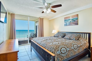 Master bedroom with private balcony overlooking the ocean 