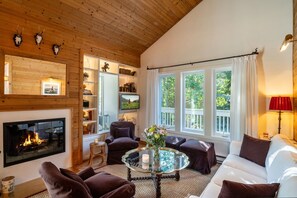 The living room is adjacent to the deck, quiet and cozy.