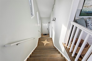 Front entrance with stairs to living area