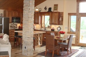 relax in the open kitchen and living area.