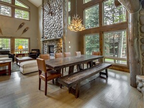 Dining area with custom made table seats 11 for big group dinners.