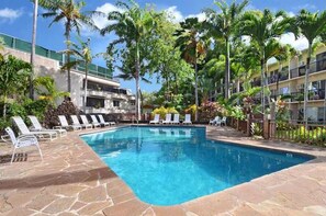 Beautiful well-kept pool just one flight down and within the garden area. 