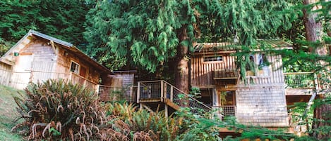 View of bathhouse (left), sleeping quarters (top), and living quarters (bottom).