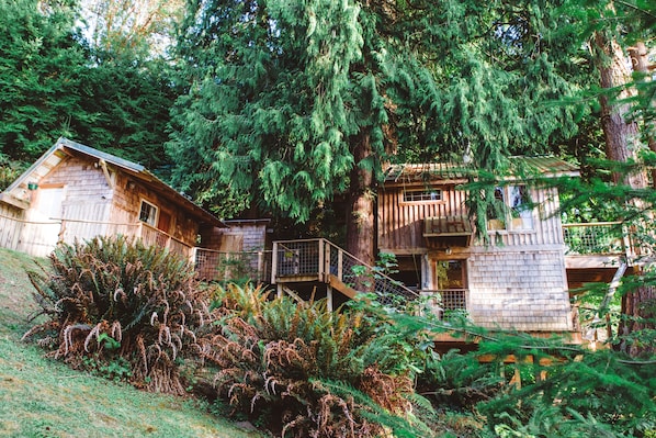 View of bathhouse (left), sleeping quarters (top), and living quarters (bottom).