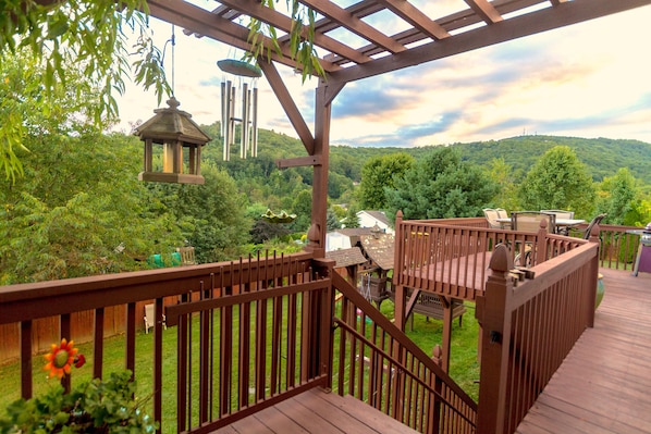 Spacious back yard - playground, fire pit, trampoline, porch swings, etc.