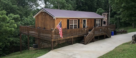 Handcrafted cedar cabin with wraparound porch