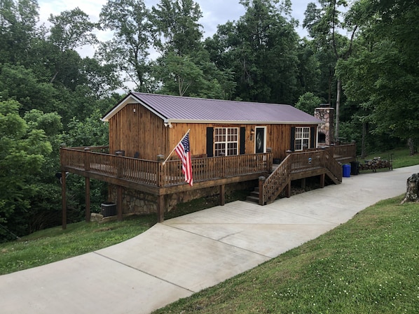 Handcrafted cedar cabin with wraparound porch