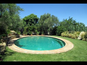 Villa's oval shaped Private Swimming Pool (8 x 15 meters, 26 x 50 feet)
