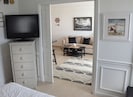 A privacy double French pocket door to separate the bedroom from the living room