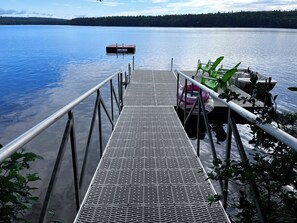Swim float. Dock. Rowboat. Shore-side trail.