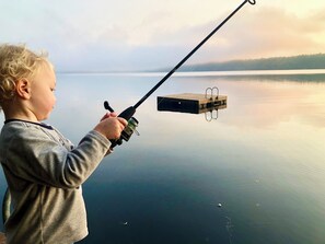 Fishing from the dock for large mouth bass.