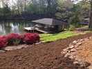 Dedicated private boat house with bar room, edison lights, covered/shaded dining
