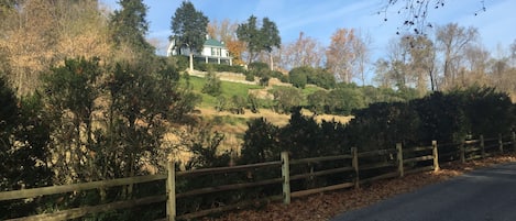 looking up to the house from the river road