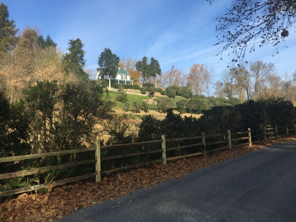 looking up to the house from the river road