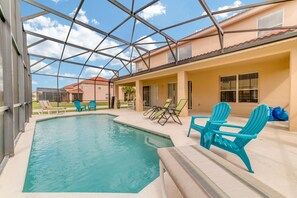 Private pool with covered lanai and children safety pool fence