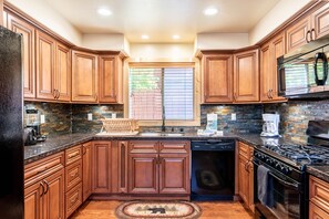 Fully stocked gourmet kitchen!