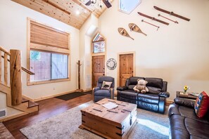 Spacious living room with rustic touches. 