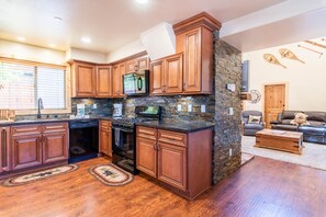 Spacious kitchen, granite counters and all essentials!