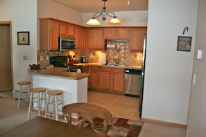 Large open kitchen, fully stocked.