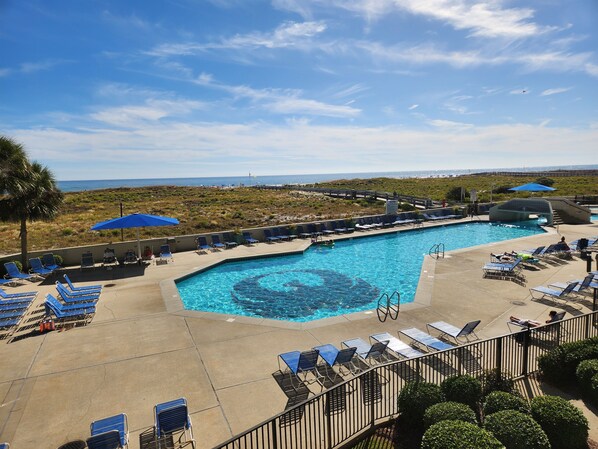 The view of the pool and Gulf from the balconey.
