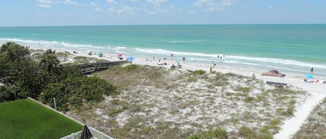 Short path through the sand dunes and you are at the beach. 