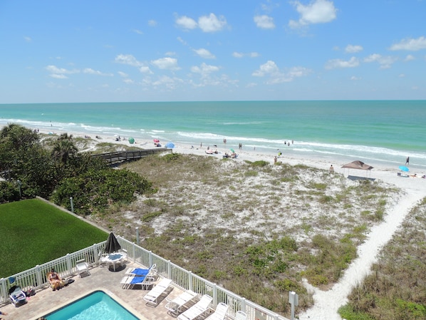 Short path through the sand dunes and you are at the beach. 