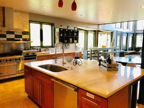Open Kitchen with Restaurant Stove.