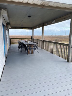 Front porch with Trex table that seats 12 