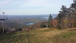 Hiking down a ski trail with views of both Little Lake Sunapee and Lake Sunapee.