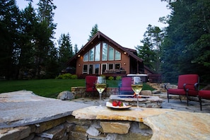 Rock fire pit with custom LED lighted steps.