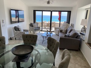 Spacious and open living area with vaulted ceilings provide a spectacular view!