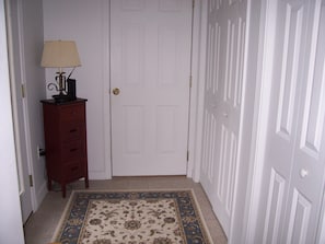 Pantry and coat closet off kitchen