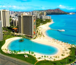Aerial view of lagoon, beach & Rainbow Tower