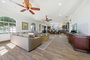The Great Room, very large, bright, loft ceiling, Kitchen is distant