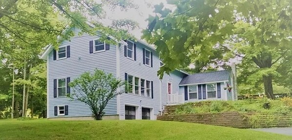 3 floors with a bump-out-sunroom on back of house.  2-tiered-Driveway. Spacious!