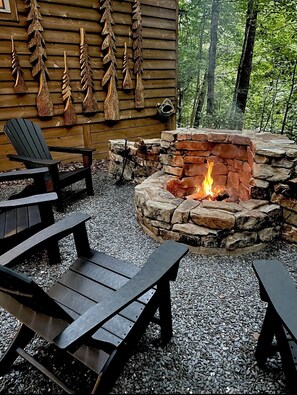 Relax By The Fire Pit While Listening To The Sweet Sounds Of The Forest