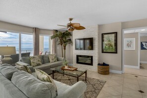 Large flat screen television and electric fieplace
