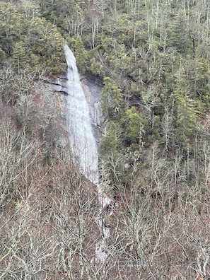 AFTER A GOOD RAIN YOU WILL ENJOY THE WATERFALL FROM THE BACK PORCH, SUBJECT RAIN