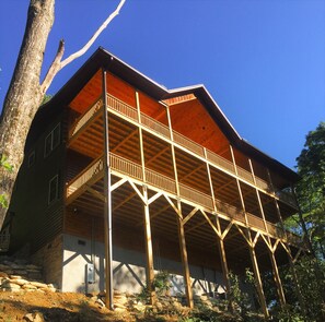 TWO VERY LARGE WRAP DECKS WITH FANTASTIC VIEWS OF WATERFALL AND MOUNTAINS