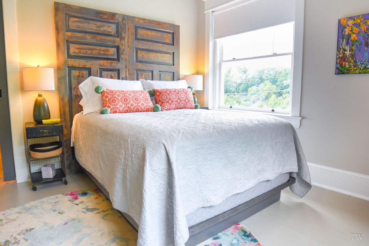 Front Guest Room with Queen Bed and Private Bathroom.