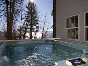 Unwind in the outdoor hot tub while soaking in breathtaking views of Lake Tahoe—a perfect way to relax after a day of adventure