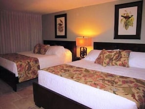 Two California King beds with premium linens and pillow top mattresses