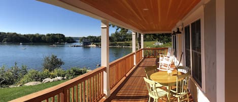 Spectacular wrap around porch with commanding view of the Cove/Ocean