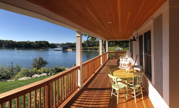 Spectacular wrap around porch with commanding view of the Cove/Ocean