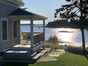 Large, comfy, oceanside porch with sun set views of Flood's Cove...