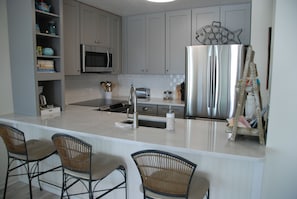 All new kitchen cabinets stainless steel appliance,
quartz counter tops.