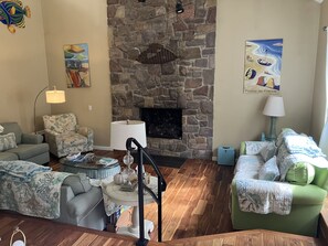 Enjoy cozy evenings by the large gas fireplace.